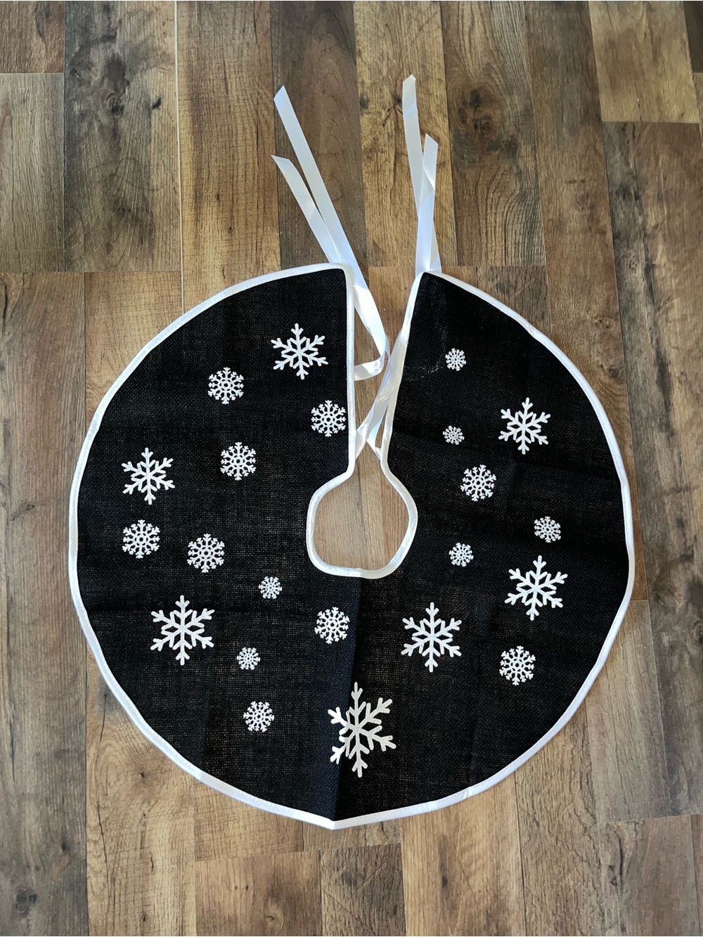 Black Snowflake Tree Skirt with White Trim